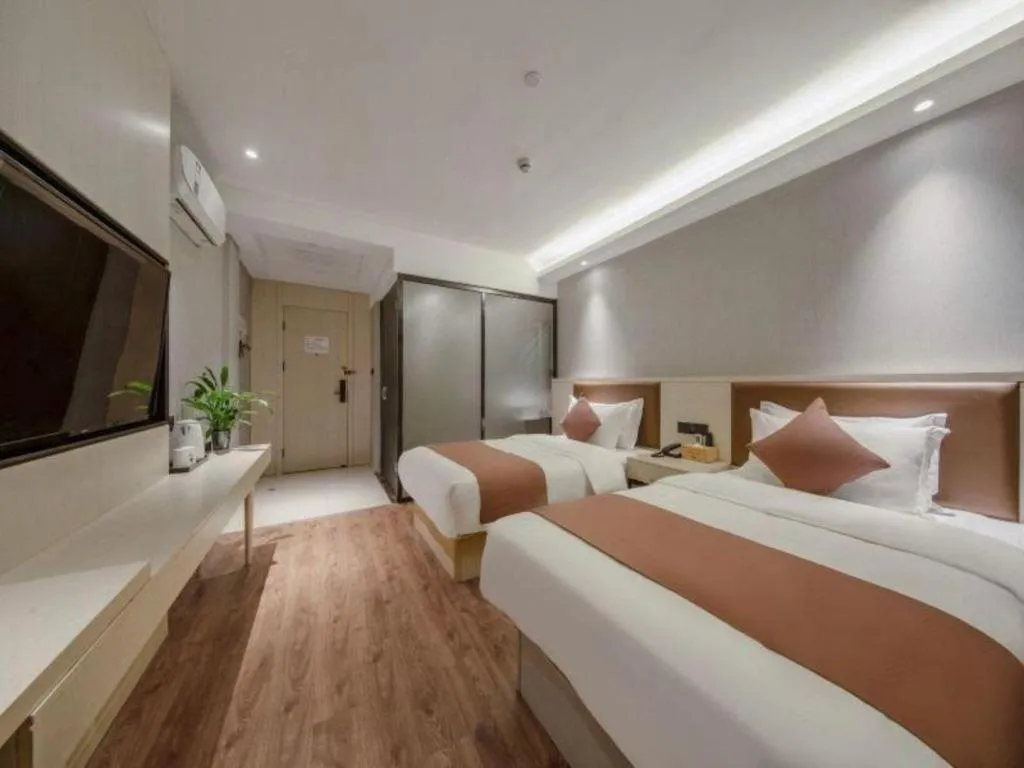 Bed in Gya Hotel Shanghai Long Distance Passenger Terminal Station