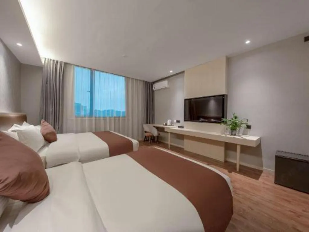 Bed in Gya Hotel Shanghai Long Distance Passenger Terminal Station