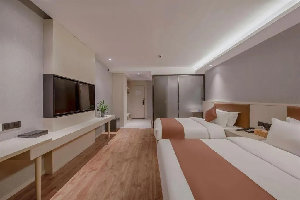 Bed in Gya Hotel Shanghai Long Distance Passenger Terminal Station