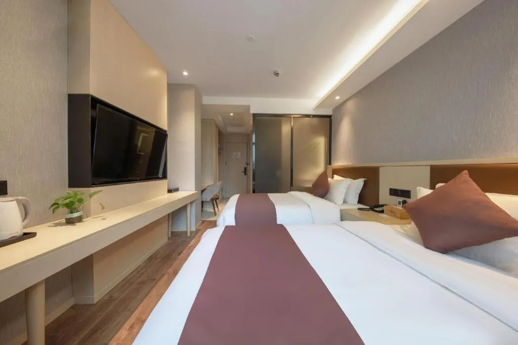 Bed in Gya Hotel Shanghai Long Distance Passenger Terminal Station