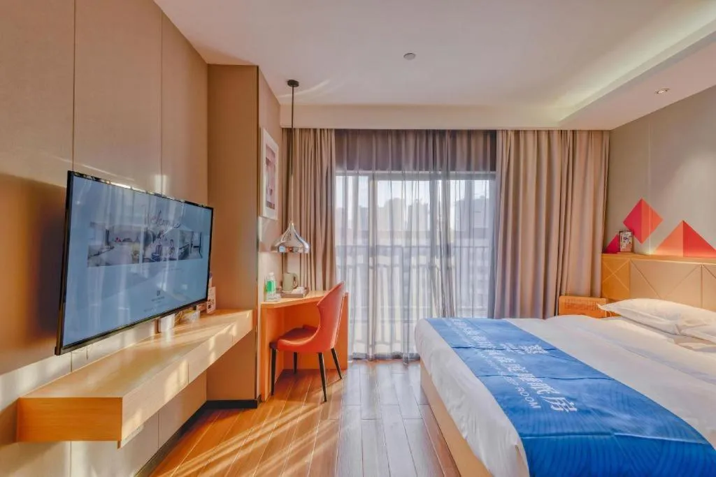 Bed in Borrman Hotel Zhaoqing Sihui Tianguangxu Jade City