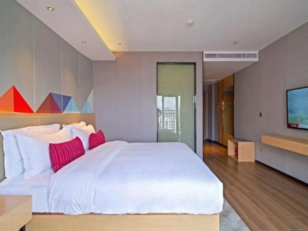 Bed in Borrman Hotel Zhaoqing Sihui Tianguangxu Jade City