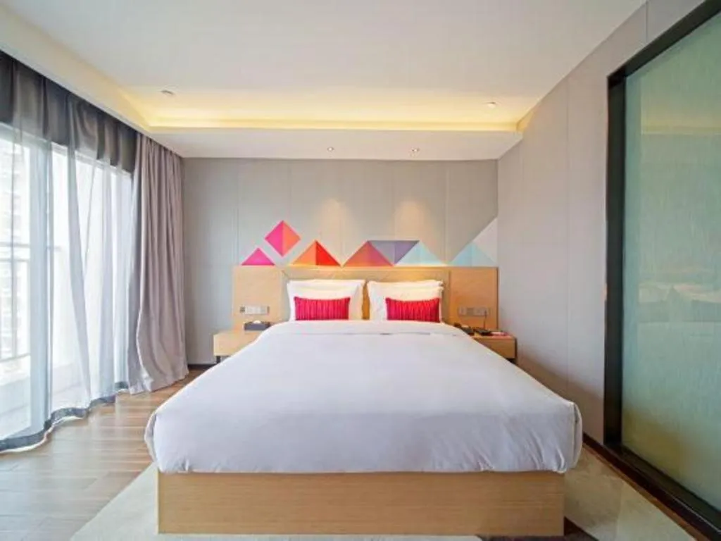 Bed in Borrman Hotel Zhaoqing Sihui Tianguangxu Jade City