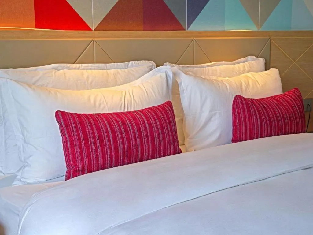 Bed in Borrman Hotel Zhaoqing Sihui Tianguangxu Jade City