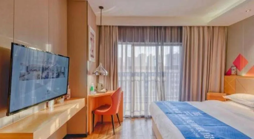 Bed in Borrman Hotel Zhaoqing Sihui Tianguangxu Jade City