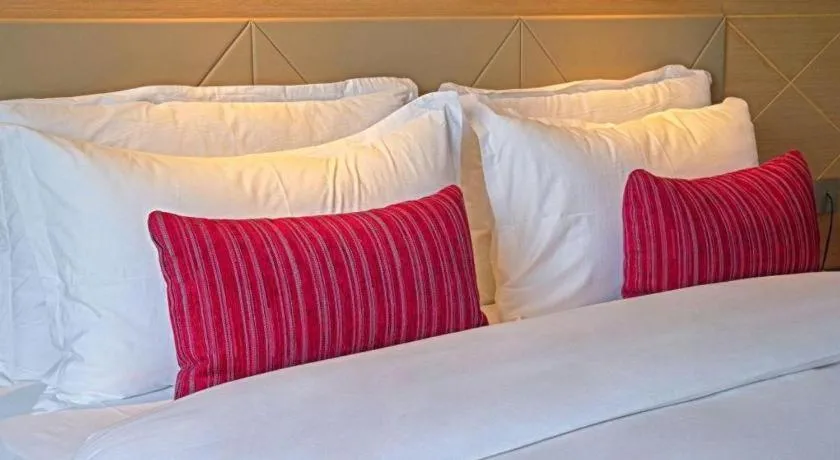 Bed in Borrman Hotel Zhaoqing Sihui Tianguangxu Jade City