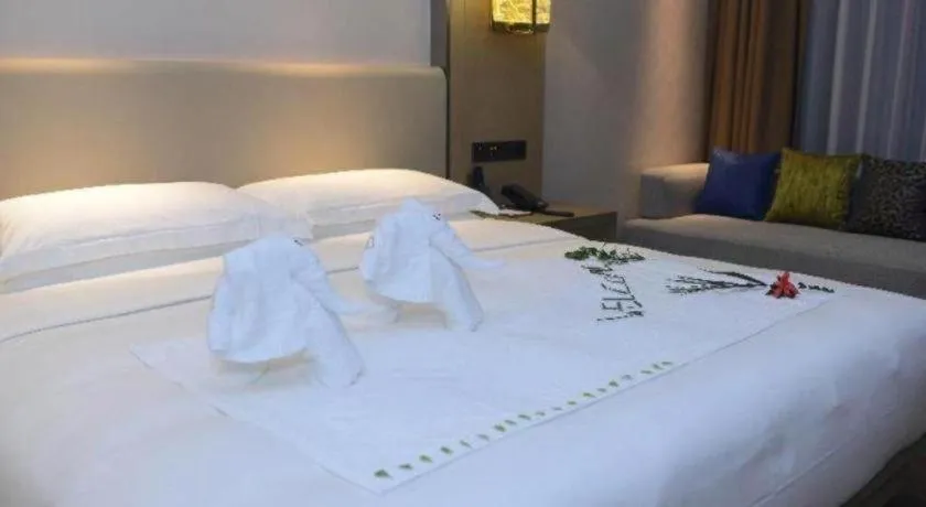 Bed in Derayco Hotel Foshan