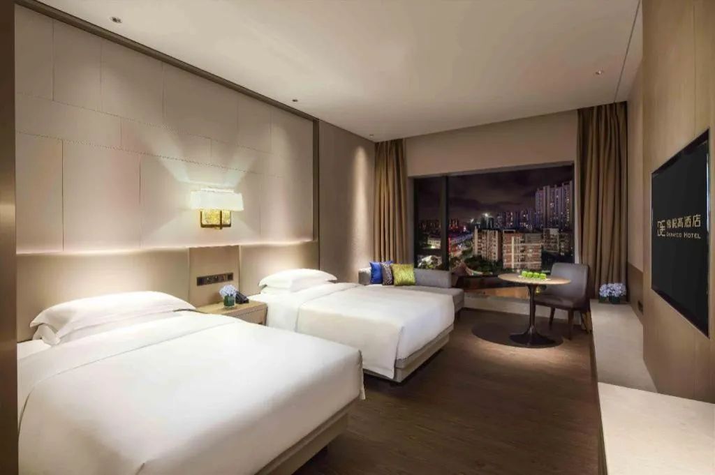 Bed in Derayco Hotel Foshan