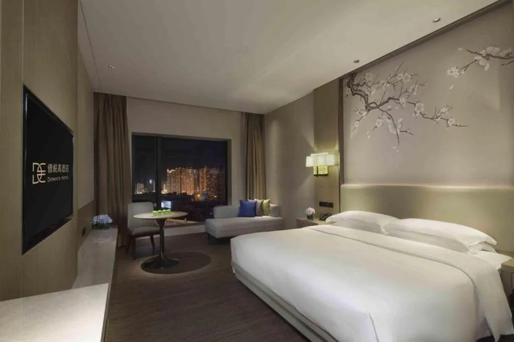 Bed in Derayco Hotel Foshan