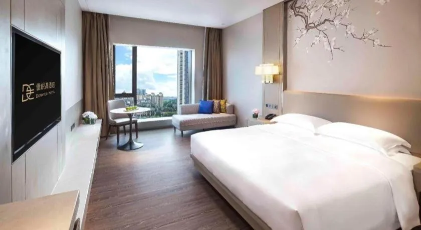 Bed in Derayco Hotel Foshan