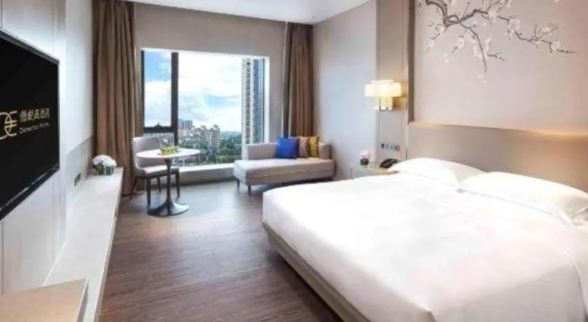 Bed in Derayco Hotel Foshan