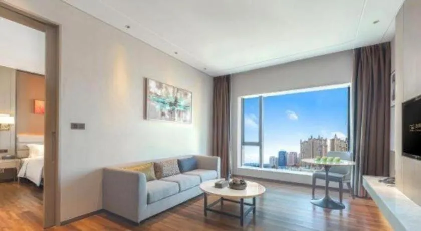 Bed in Derayco Hotel Foshan