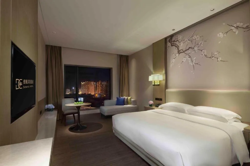 Bed in Derayco Hotel Foshan