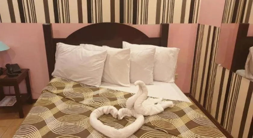 Bed in Walk Around Hotel