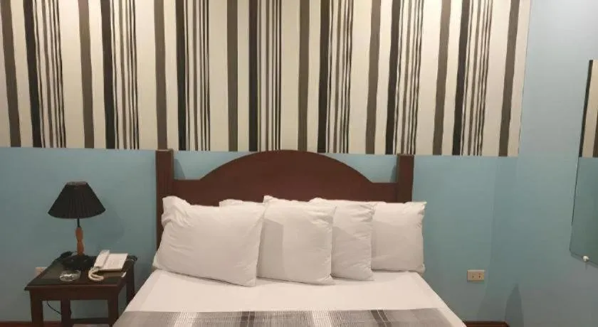 Bed in Walk Around Hotel