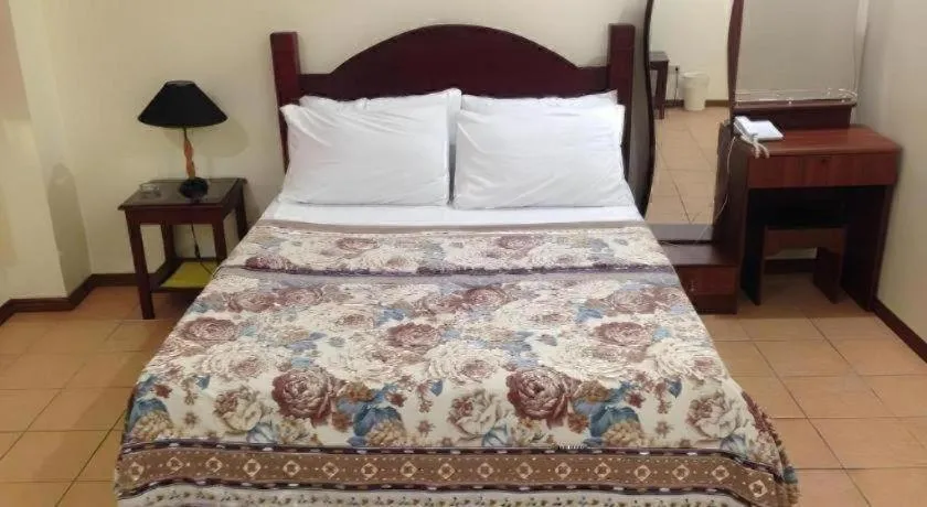 Bed in Walk Around Hotel