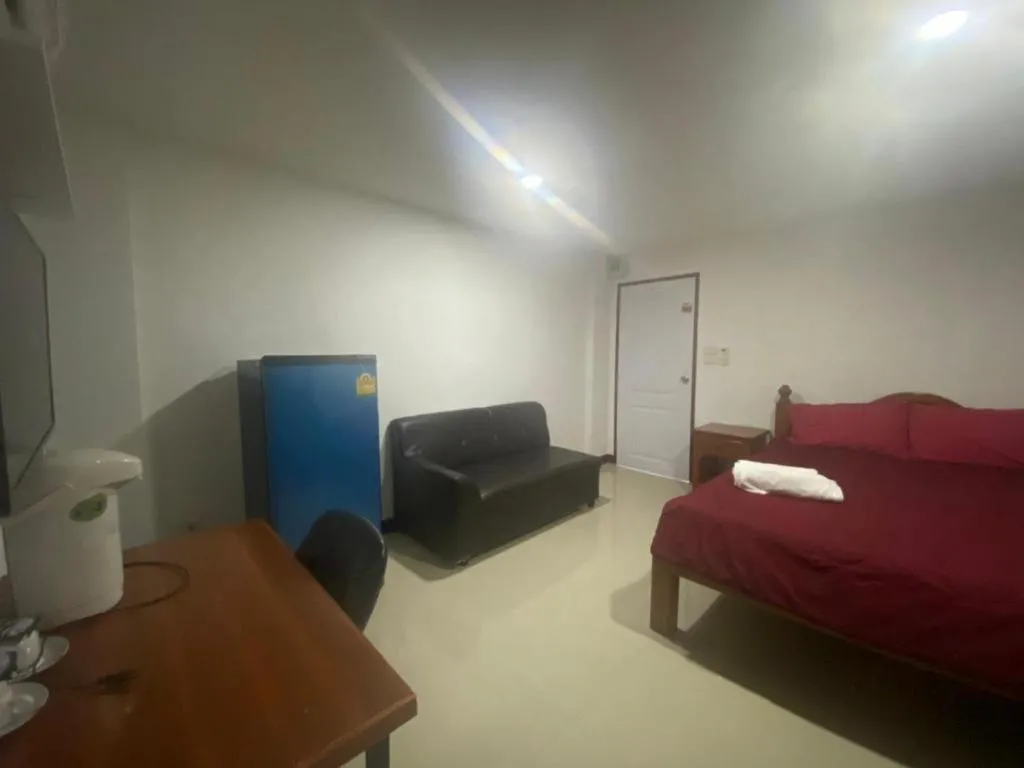 Bed in OYO 1135 Triple A Residence