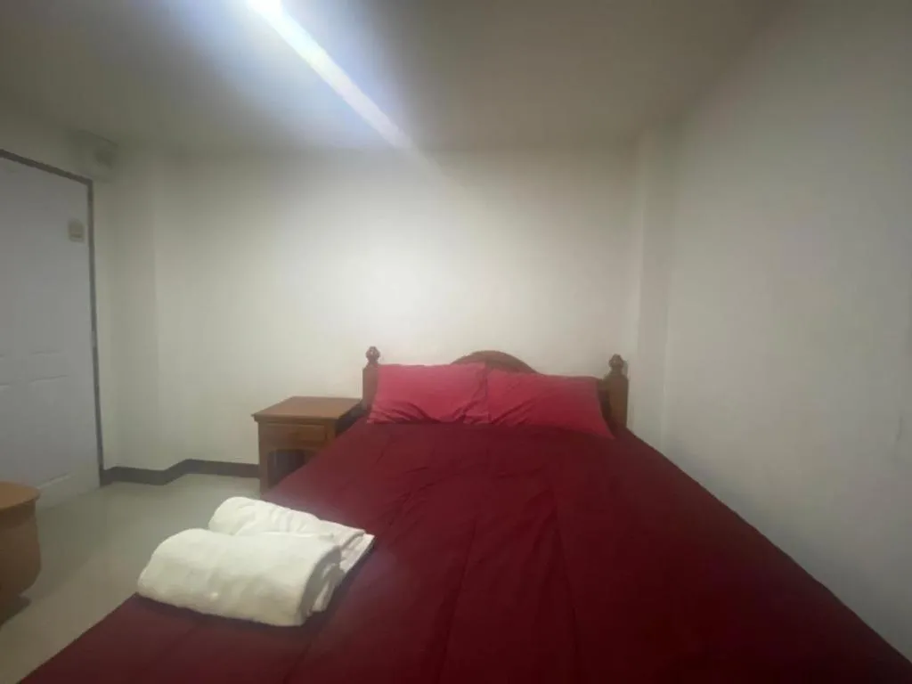 Bed in OYO 1135 Triple A Residence