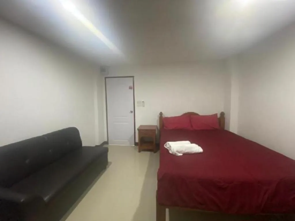 Bed in OYO 1135 Triple A Residence