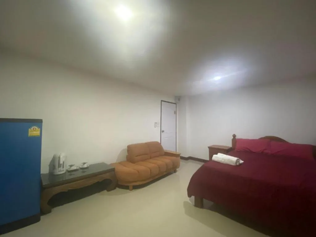 Bed in OYO 1135 Triple A Residence