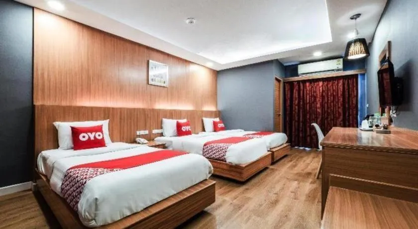 Bed in OYO 1126 Curve Boutique Pattaya
