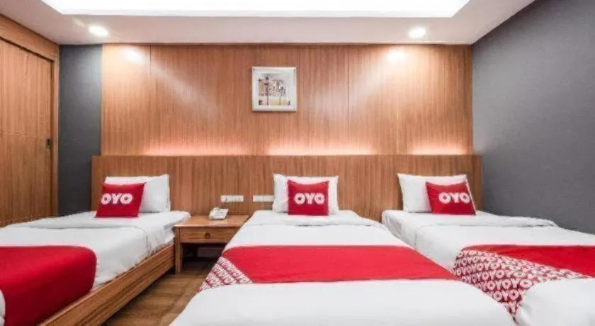 Bed in OYO 1126 Curve Boutique Pattaya