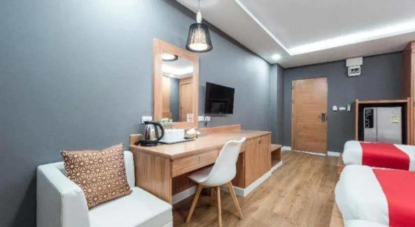 Bed in OYO 1126 Curve Boutique Pattaya