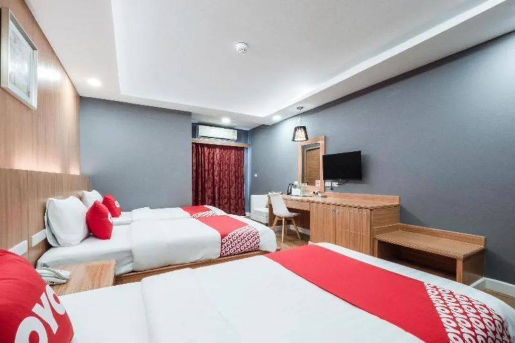 Bed in OYO 1126 Curve Boutique Pattaya