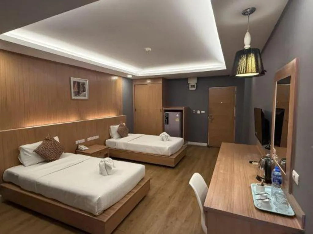 Bed in OYO 1126 Curve Boutique Pattaya