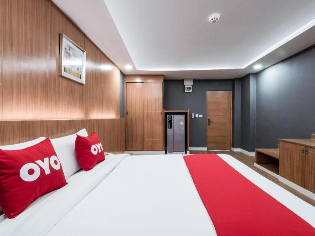 Bed in OYO 1126 Curve Boutique Pattaya