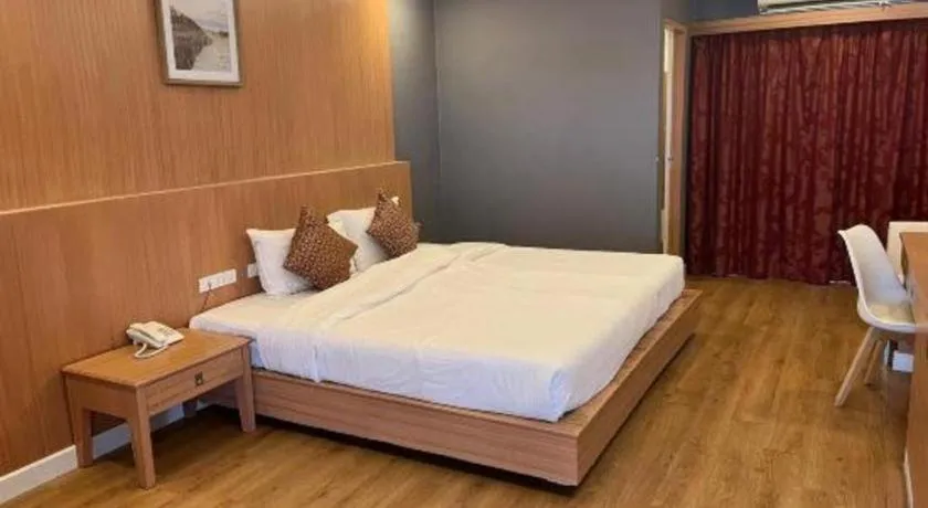 Bed in OYO 1126 Curve Boutique Pattaya