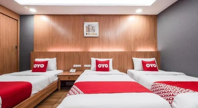 Bed in OYO 1126 Curve Boutique Pattaya