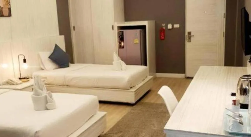 Bed in OYO 1126 Curve Boutique Pattaya