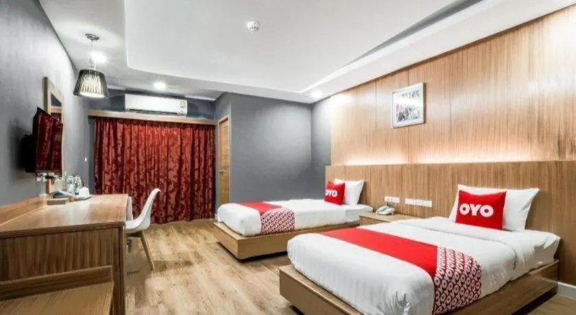 Bed in OYO 1126 Curve Boutique Pattaya