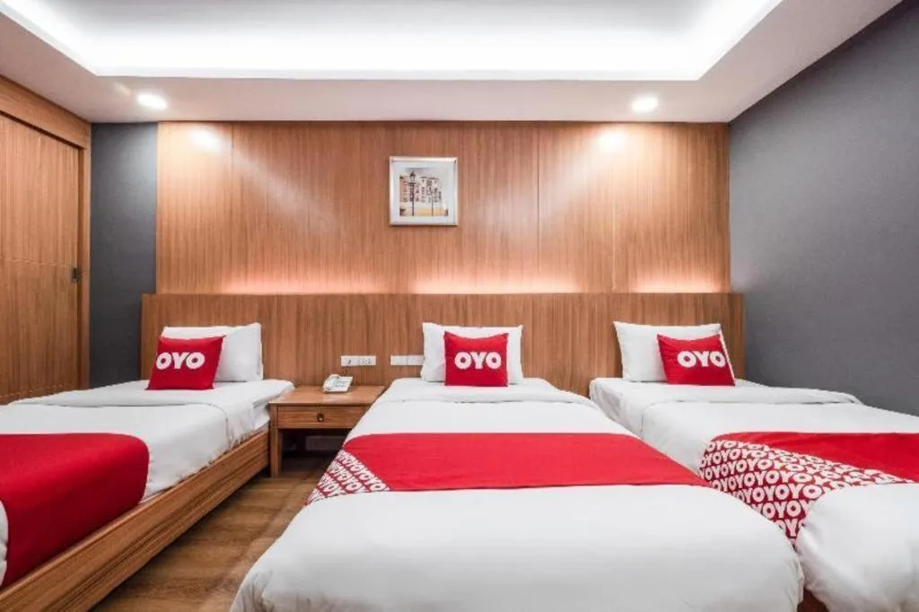 Bed in OYO 1126 Curve Boutique Pattaya