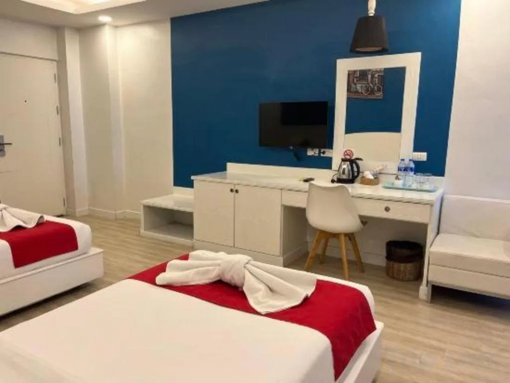 Bed in OYO 1126 Curve Boutique Pattaya