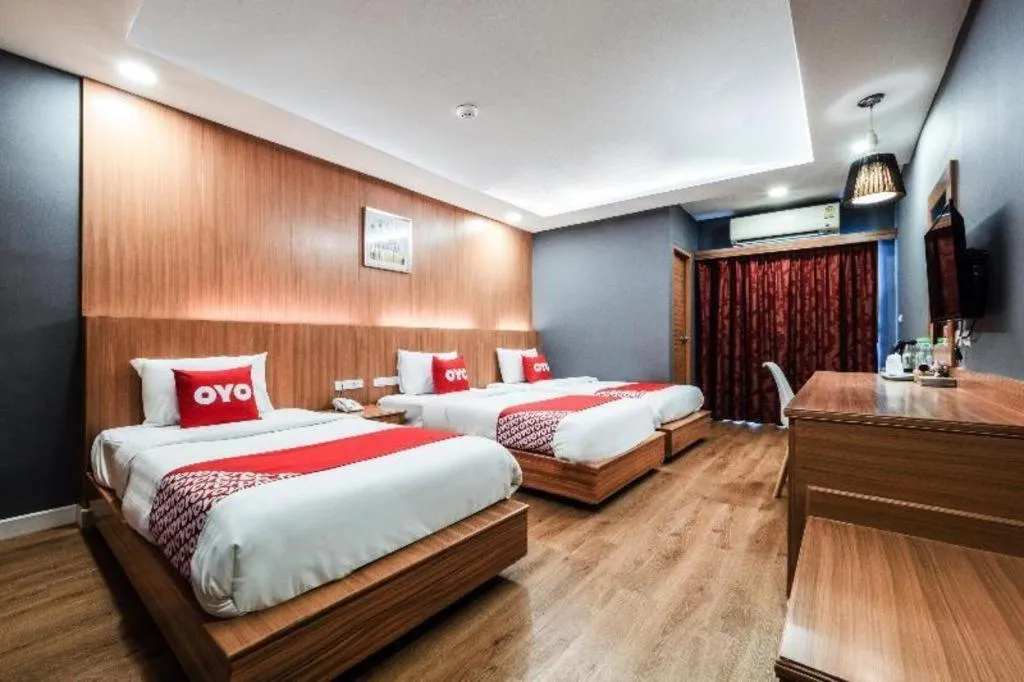 Bed in OYO 1126 Curve Boutique Pattaya