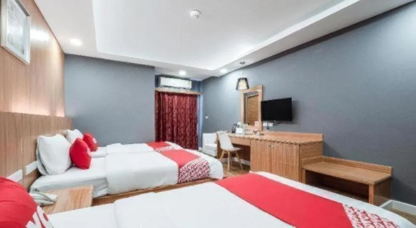 Bed in OYO 1126 Curve Boutique Pattaya