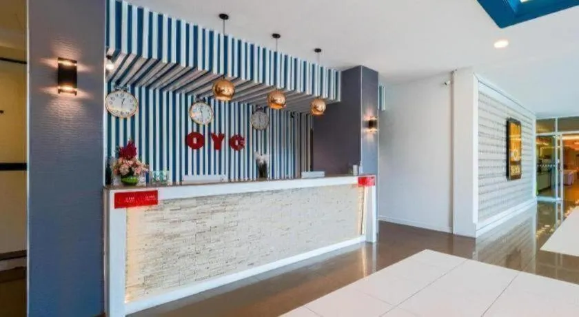 Bed in OYO 1126 Curve Boutique Pattaya