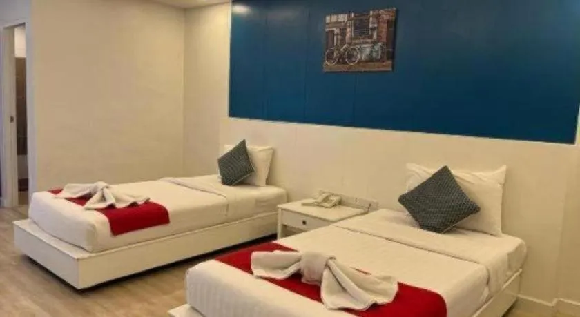 Bed in OYO 1126 Curve Boutique Pattaya