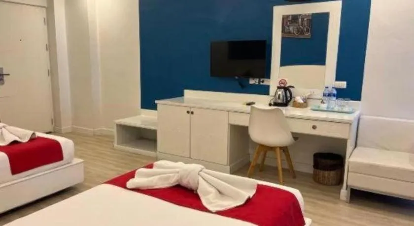 Bed in OYO 1126 Curve Boutique Pattaya