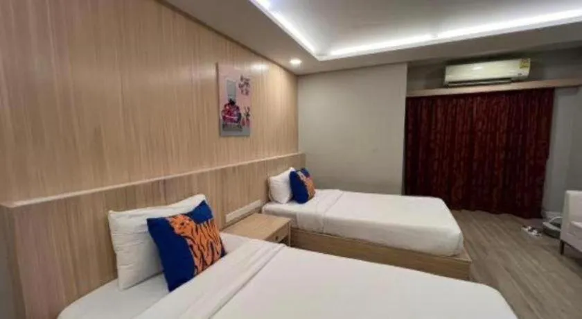 Bed in OYO 1126 Curve Boutique Pattaya