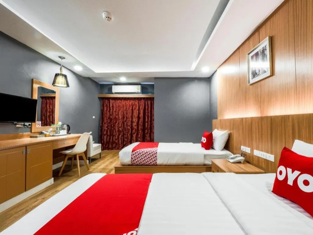 Bed in OYO 1126 Curve Boutique Pattaya
