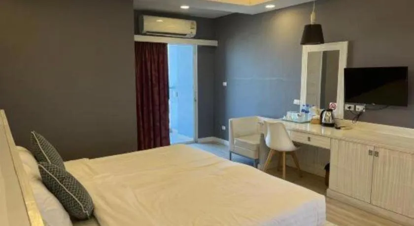 Bed in OYO 1126 Curve Boutique Pattaya