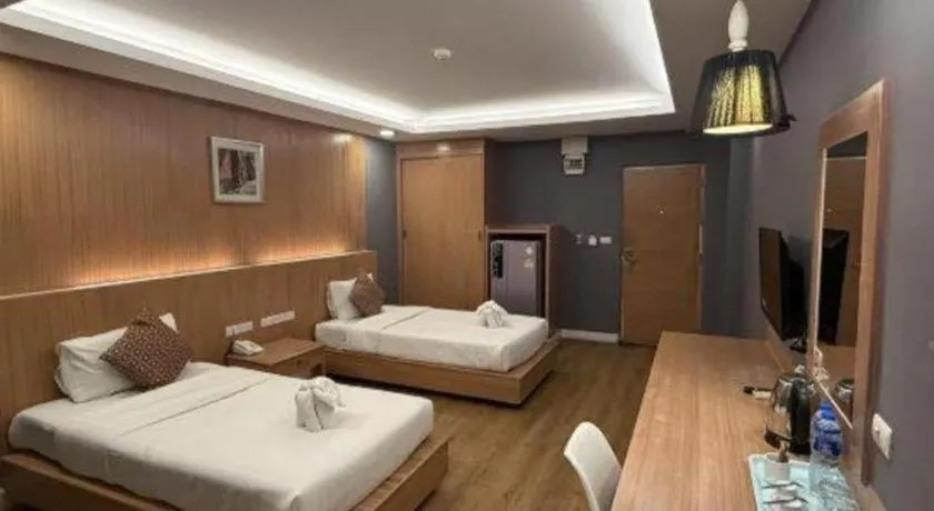 Bed in OYO 1126 Curve Boutique Pattaya