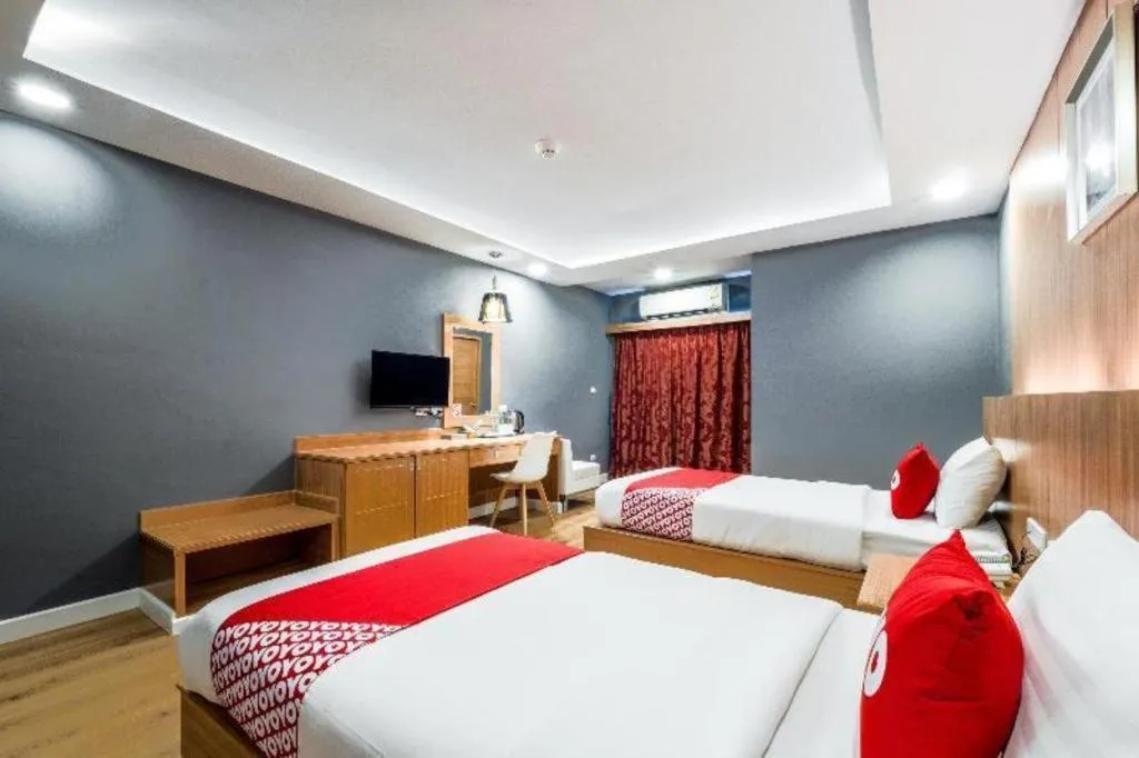 Bed in OYO 1126 Curve Boutique Pattaya