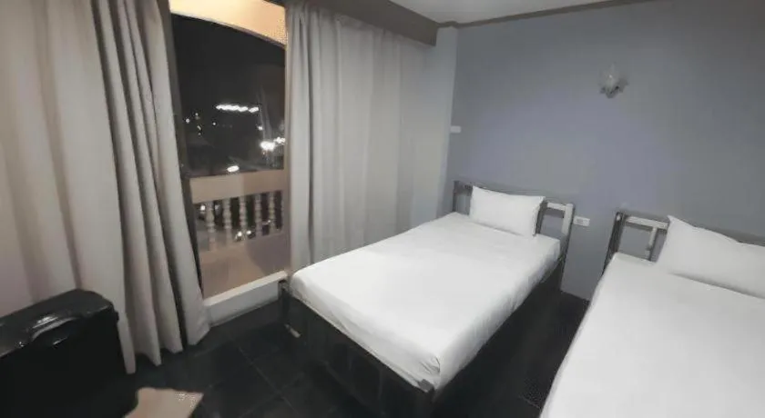 Bed in Grand PL Hotel