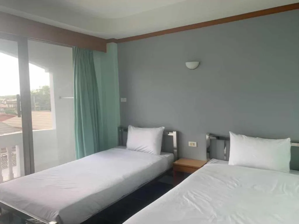 Bed in Grand PL Hotel