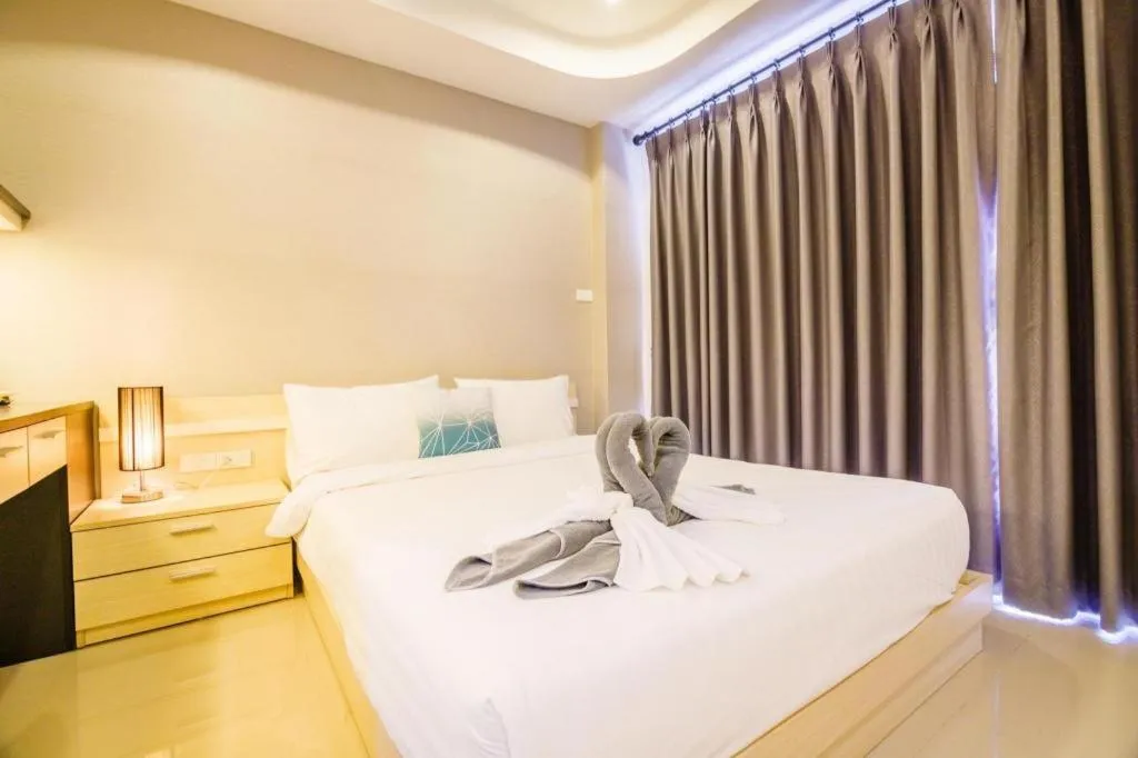 Bed in Grand PL Hotel