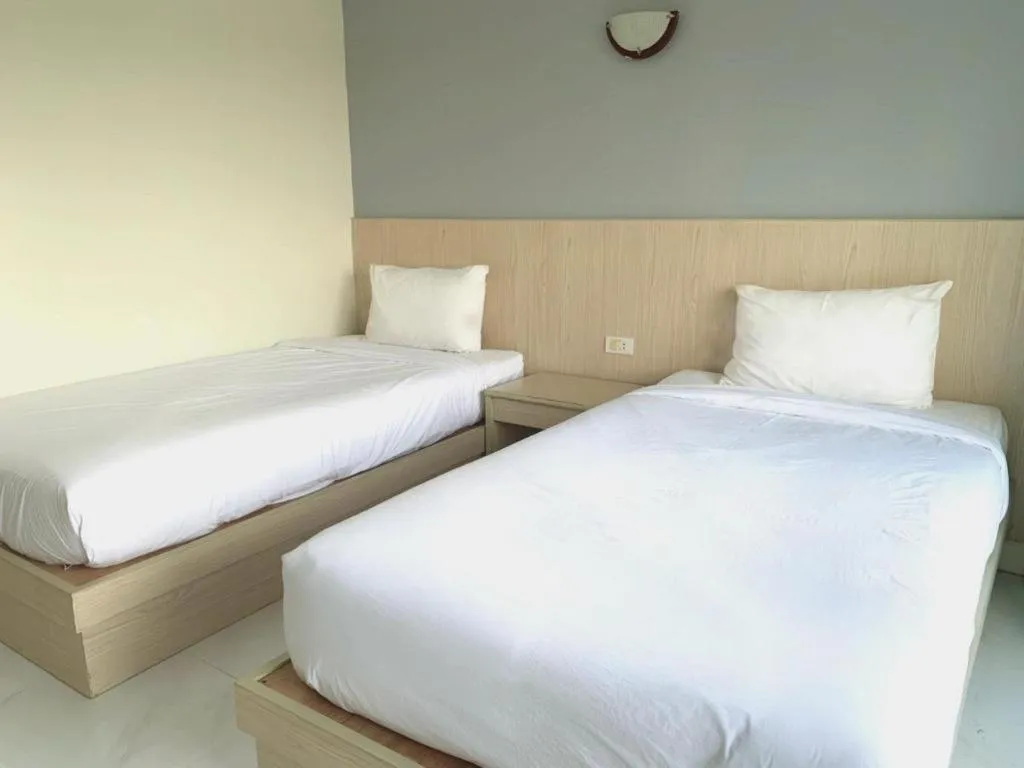 Bed in Grand PL Hotel